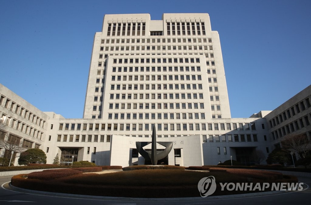 ‘코인 상장 뒷거래’ 전 코인원 임직원 실형 확정